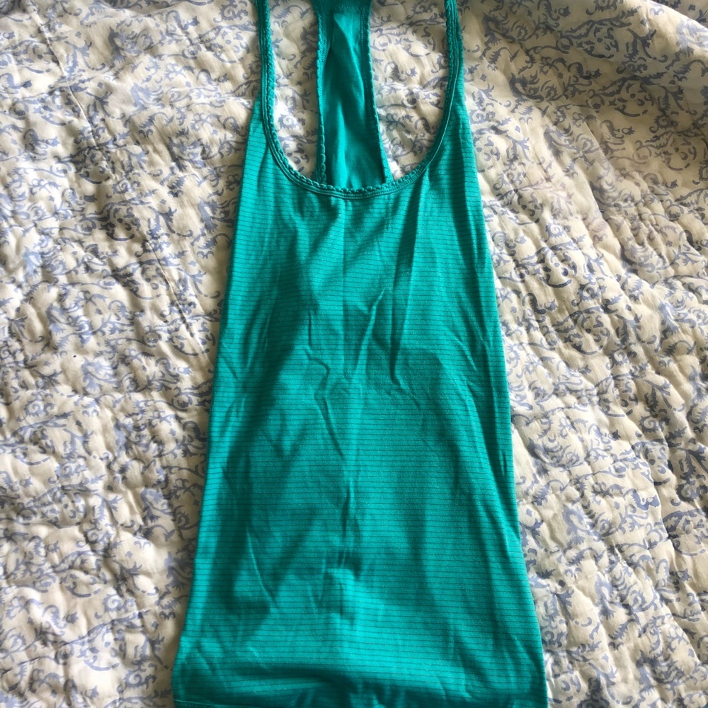 FOUR LULU LEMON TANK TOPS